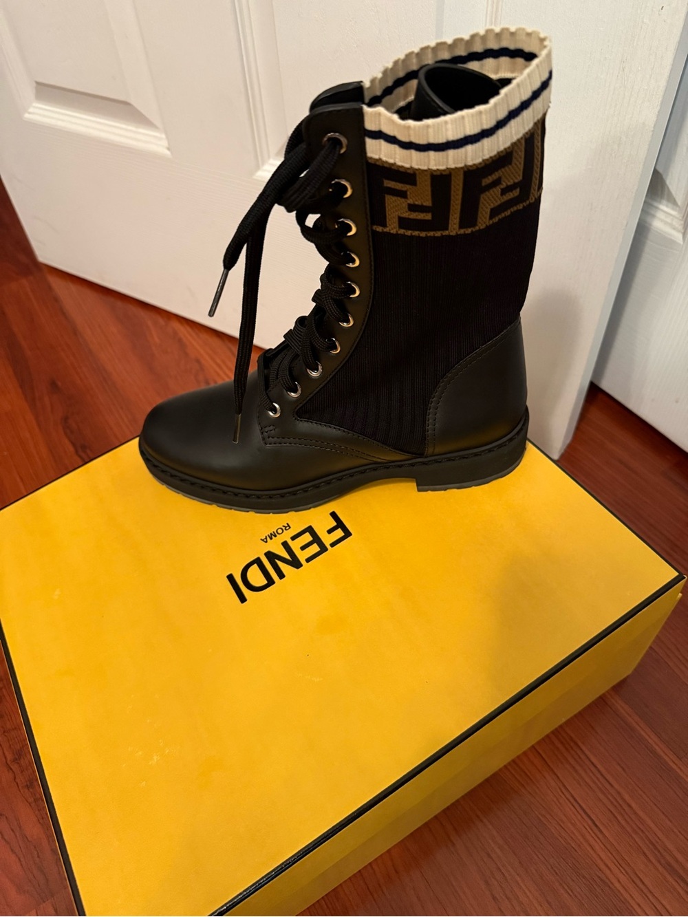 Fendi Black Combat Boot with Brown FF Knit Cuff and Cream Trim

FIRM PRICE